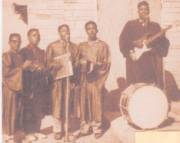 A group of musicians singing negro spirituals