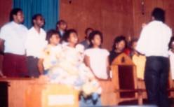 A group of singers in a church.